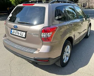 Subaru Forester 2014 autóbérlés Grúziában, jellemzők ✓ Benzin üzemanyag és 149 lóerő ➤ Napi 105 GEL-tól kezdődően.