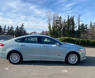 Ford Fusion Sedan rental. Comfort, Premium Car for Renting in Georgia ✓ Deposit of 300 GEL ✓ TPL, CDW, Passengers insurance options.