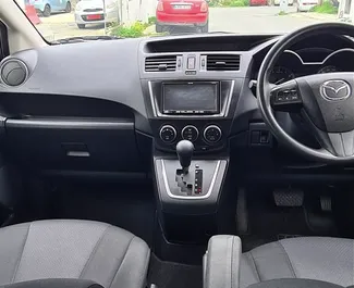 Mazda Premacy rental. Comfort, Minivan Car for Renting in Cyprus ✓ Deposit of 1000 EUR ✓ TPL, CDW, SCDW, Young insurance options.