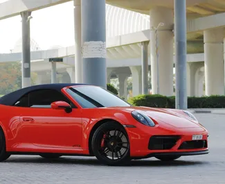 Front view of a rental Porsche Carrera 911 S Cabrio in Dubai, UAE ✓ Car #6799. ✓ Automatic TM ✓ 0 reviews.