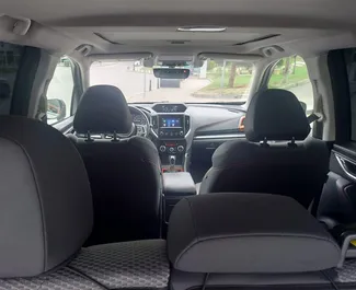 Interior de Subaru Forester Limited para alquilar en Georgia. Un gran coche de 5 plazas con transmisión Automático.