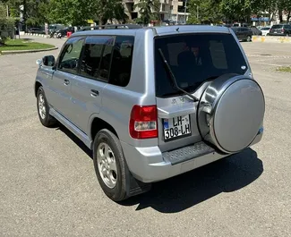 Mitsubishi Pajero Io rental. Economy, Comfort, SUV Car for Renting in Georgia ✓ Without Deposit ✓ TPL, FDW, Theft, Abroad, No Deposit insurance options.
