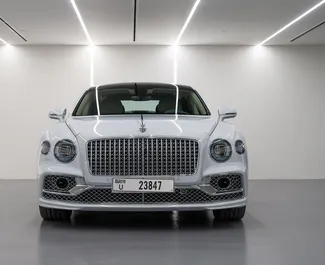 Front view of a rental Bentley Flying Spur in Dubai, UAE ✓ Car #6740. ✓ Automatic TM ✓ 0 reviews.