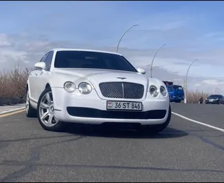 Front view of a rental Bentley Flying Spur in Yerevan, Armenia ✓ Car #6771. ✓ Automatic TM ✓ 0 reviews.