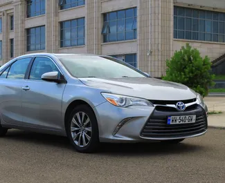 Front view of a rental Toyota Camry in Tbilisi, Georgia ✓ Car #6673. ✓ Automatic TM ✓ 0 reviews.