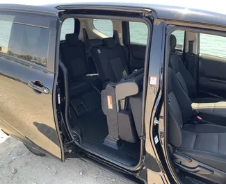 Interior of Toyota Sienta for hire in Cyprus. A Great 7-seater car with a Automatic transmission.