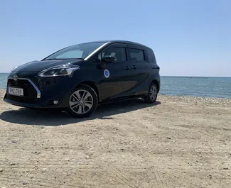 Front view of a rental Toyota Sienta in Larnaca, Cyprus ✓ Car #6804. ✓ Automatic TM ✓ 0 reviews.