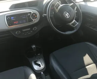 Hybrid 1.3L engine of Toyota Yaris 2015 for rental in Larnaca.