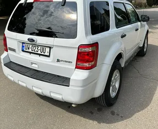 Prenájom auta Ford Escape 2010 v v Gruzínsku, s vlastnosťami ✓ palivo Hybrid a výkon 180 koní ➤ Od 100 GEL za deň.