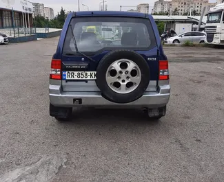 Mitsubishi Pajero Io 1998 with All wheel drive system, available in Tbilisi.