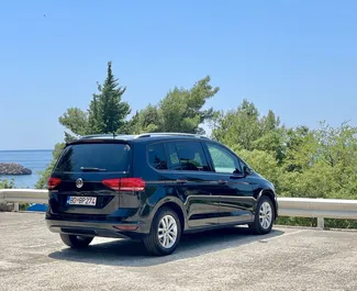 Volkswagen Touran 2020 car hire in Montenegro, featuring ✓ Diesel fuel and 120 horsepower ➤ Starting from 25 EUR per day.