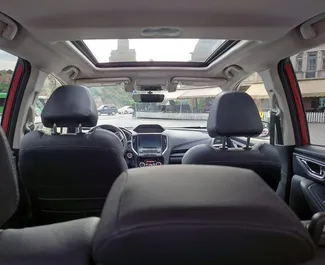 Interior do Subaru Forester Limited para aluguer na Geórgia. Um excelente carro de 5 lugares com transmissão Automático.