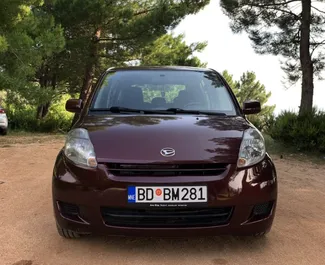 Front view of a rental Daihatsu Sirion in Budva, Montenegro ✓ Car #6584. ✓ Automatic TM ✓ 0 reviews.