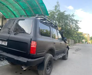 Car Hire Toyota Land Cruiser 80 #7075 Automatic in Osh, equipped with 4.5L engine ➤ From Oybek in Kyrgyzstan.