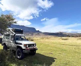 Front view of a rental Toyota Land Cruiser 70 in Osh, Kyrgyzstan ✓ Car #7080. ✓ Manual TM ✓ 0 reviews.