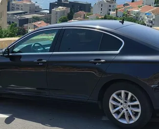 Front view of a rental Volkswagen Passat in Budva, Montenegro ✓ Car #7035. ✓ Automatic TM ✓ 0 reviews.