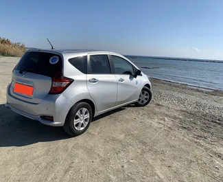 Front view of a rental Nissan Note in Larnaca, Cyprus ✓ Car #6829. ✓ Automatic TM ✓ 0 reviews.