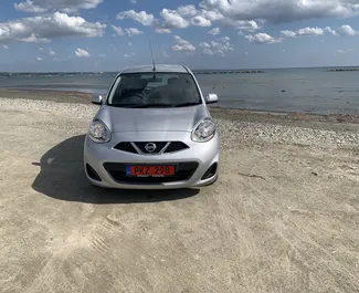 Front view of a rental Nissan March in Larnaca, Cyprus ✓ Car #7158. ✓ Automatic TM ✓ 0 reviews.