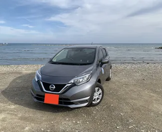 Front view of a rental Nissan Note in Larnaca, Cyprus ✓ Car #7099. ✓ Automatic TM ✓ 0 reviews.