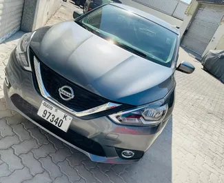 Najem avtomobila Nissan Sentra 2019 v v ZAE, z značilnostmi ✓ gorivo Bencin in  konjskih moči ➤ Od 88 AED na dan.