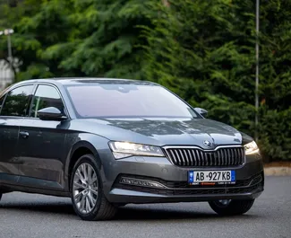 Front view of a rental Skoda Superb in Tirana, Albania ✓ Car #7137. ✓ Automatic TM ✓ 0 reviews.