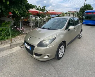 Front view of a rental Renault Scenic in Tirana, Albania ✓ Car #7282. ✓ Manual TM ✓ 0 reviews.