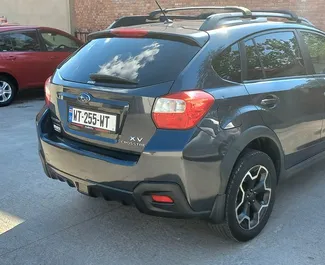Najem avtomobila Subaru Crosstrek 2014 v v Gruziji, z značilnostmi ✓ gorivo Bencin in 156 konjskih moči ➤ Od 90 GEL na dan.