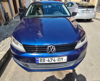 Front view of a rental Volkswagen Jetta at Kutaisi Airport, Georgia ✓ Car #7183. ✓ Automatic TM ✓ 5 reviews.