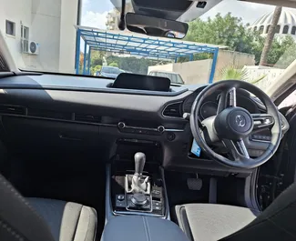 Prenájom auta Mazda CX-30 2020 v na Cypre, s vlastnosťami ✓ palivo Benzín a výkon 115 koní ➤ Od 75 EUR za deň.