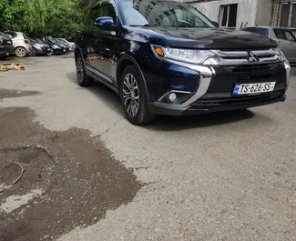 Μπροστινή όψη ενοικιαζόμενου Mitsubishi Outlander Xl στην Τιφλίδα, Γεωργία ✓ Αριθμός αυτοκινήτου #7325. ✓ Κιβώτιο ταχυτήτων Αυτόματο TM ✓ 1 κριτικές.