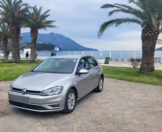 Vista frontal de um aluguel Volkswagen Golf 7 em Budva, Montenegro ✓ Carro #7188. ✓ Transmissão Automático TM ✓ 1 avaliações.