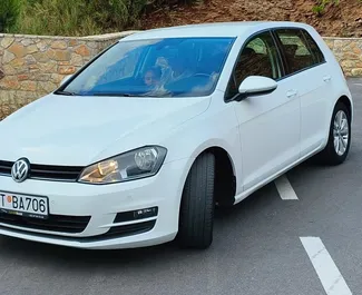 Front view of a rental Volkswagen Golf 7 in Budva, Montenegro ✓ Car #7184. ✓ Automatic TM ✓ 0 reviews.