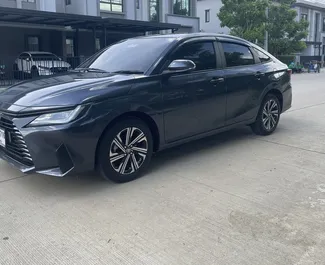 Front view of a rental Toyota Yaris Ativ at Bangkok Don Muang Airport, Thailand ✓ Car #6452. ✓ Automatic TM ✓ 0 reviews.