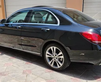 Mercedes-Benz C-Class rental. Comfort, Premium Car for Renting in the UAE ✓ Deposit of 2000 AED ✓ TPL, CDW, SCDW, Passengers, Theft insurance options.