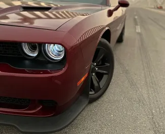 Dodge Challenger rental. Premium, Luxury Car for Renting in the UAE ✓ Deposit of 2000 AED ✓ TPL, CDW, SCDW, Passengers, Theft, No Deposit insurance options.
