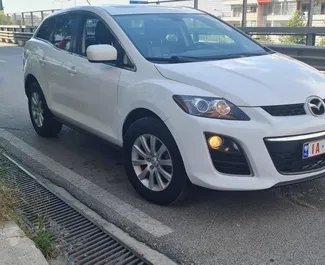 Front view of a rental Mazda CX-7 in Tirana, Albania ✓ Car #6704. ✓ Automatic TM ✓ 0 reviews.