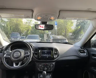 Petrol 2.4L engine of Jeep Compass 2019 for rental in Tbilisi.
