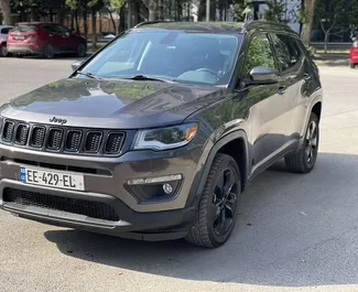 Front view of a rental Jeep Compass in Tbilisi, Georgia ✓ Car #7181. ✓ Automatic TM ✓ 1 reviews.