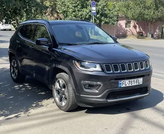 Jeep Compass 2017 car hire in Georgia, featuring ✓ Petrol fuel and 180 horsepower ➤ Starting from 120 GEL per day.