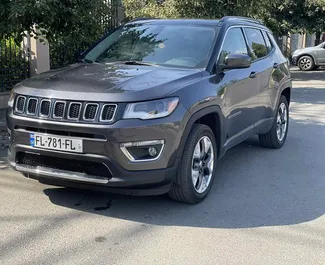 Front view of a rental Jeep Compass in Tbilisi, Georgia ✓ Car #7253. ✓ Automatic TM ✓ 0 reviews.