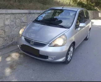 Front view of a rental Honda Jazz in Durres, Albania ✓ Car #7424. ✓ Automatic TM ✓ 1 reviews.