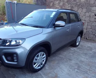 Front view of a rental Suzuki Vitara Brezza at Mauritius Airport, Mauritius ✓ Car #7379. ✓ Automatic TM ✓ 0 reviews.