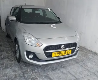 Front view of a rental Suzuki Swift in Mauritius, Mauritius ✓ Car #7423. ✓ Automatic TM ✓ 0 reviews.