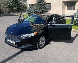 Ford Fusion Sedan 2013 car hire in Armenia, featuring ✓ Petrol fuel and 175 horsepower ➤ Starting from 54 USD per day.