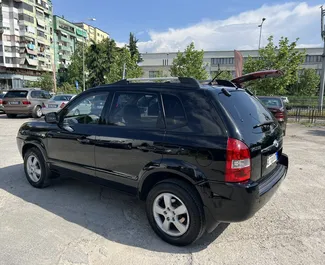 Vista frontal de um aluguel Hyundai Tucson em Tirana, Albânia ✓ Carro #7346. ✓ Transmissão Manual TM ✓ 0 avaliações.