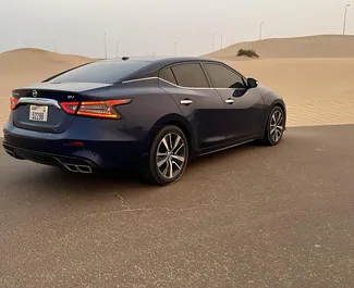 Nissan Maxima 2020 car hire in the UAE, featuring ✓ Petrol fuel and 304 horsepower ➤ Starting from 95 AED per day.