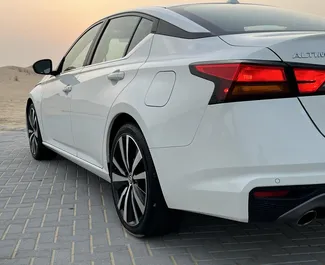 Interior of Nissan Altima for hire in the UAE. A Great 5-seater car with a Automatic transmission.