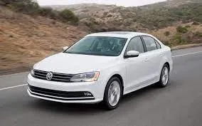 Front view of a rental Volkswagen Jetta at Agadir Airport, Morocco ✓ Car #7558. ✓ Automatic TM ✓ 0 reviews.