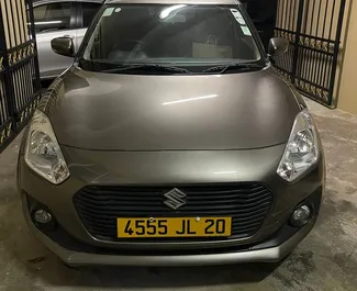 Front view of a rental Suzuki Swift in Mauritius, Mauritius ✓ Car #7461. ✓ Automatic TM ✓ 0 reviews.