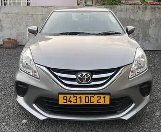 Front view of a rental Toyota Starlet in Mauritius, Mauritius ✓ Car #7463. ✓ Automatic TM ✓ 0 reviews.